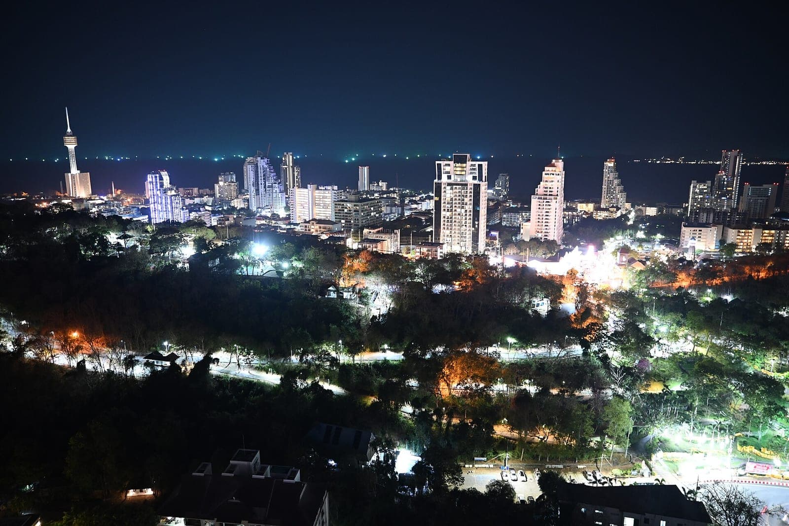Pattaya skyline at night with lit towers and the Pattaya Park tower
