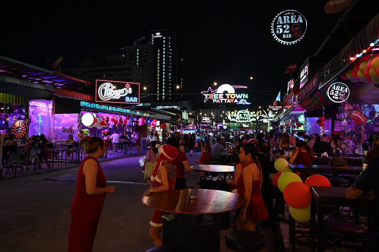 A Pattaya beer bar lit up at night