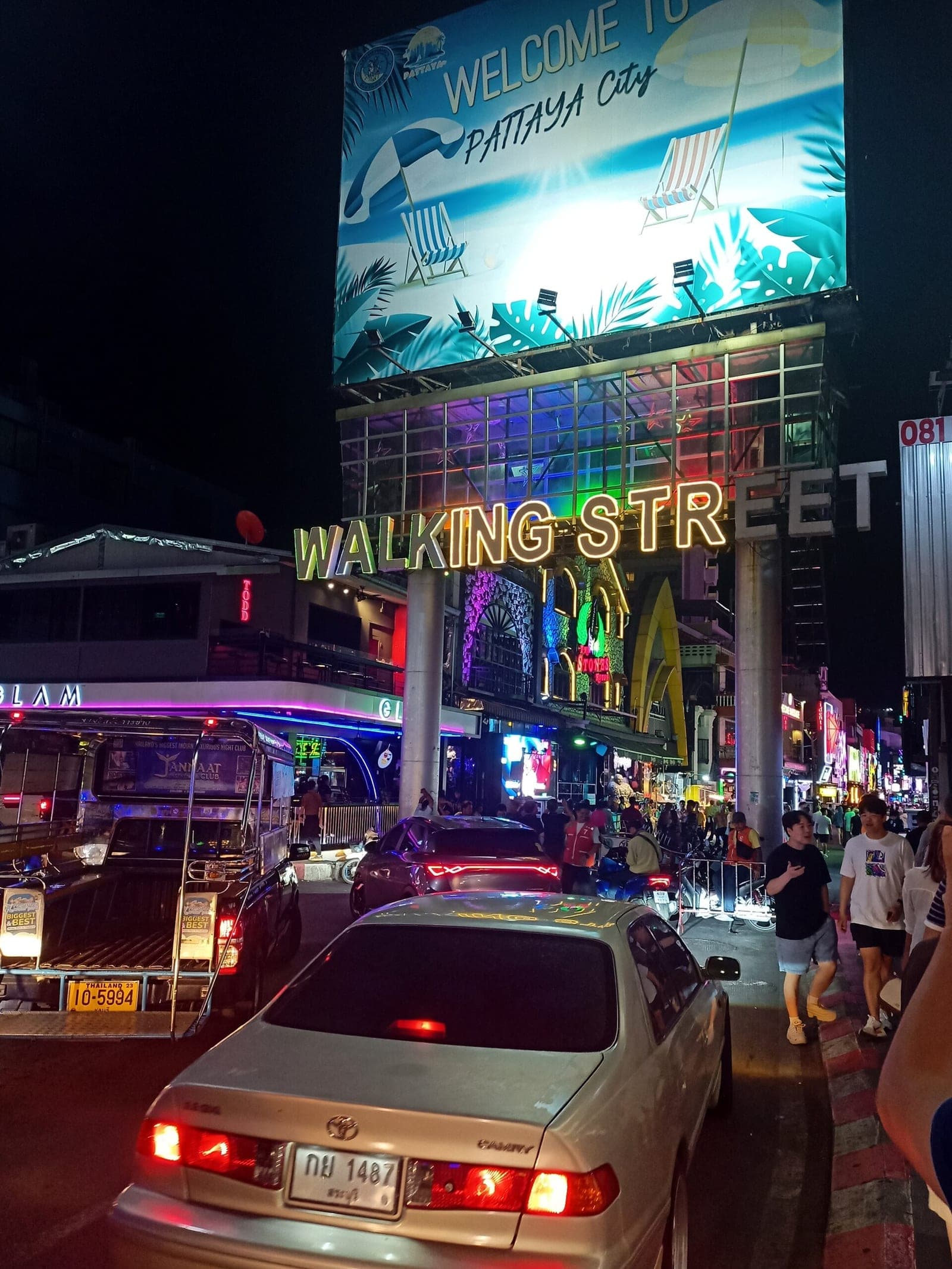 Walking Street neon entrance sign in Pattaya at night